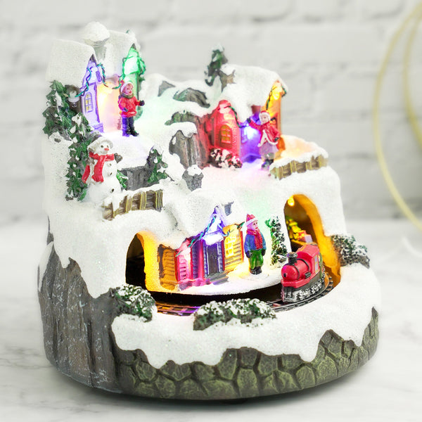 Illuminated Musical Christmas Village Set With Animated Carousel, Train Station & Figurines, LED Light-Up White Houses, Holiday Tabletop Decor by Accent Collection